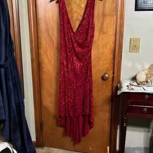 Long sparkly red dress size 18, red low cut front tail and back